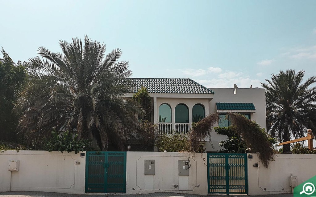 teal-roof houses in Al Shahba 