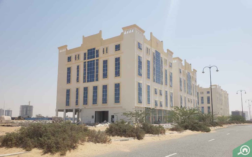Apartment buildings in Al Ameera Village
